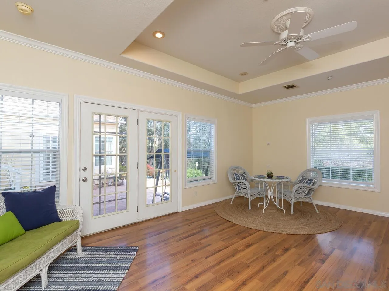 1732 Tavern Road Alpine, CA 91901 - Photo 17 of 60 a dining room with wooden floor and a chandelier
