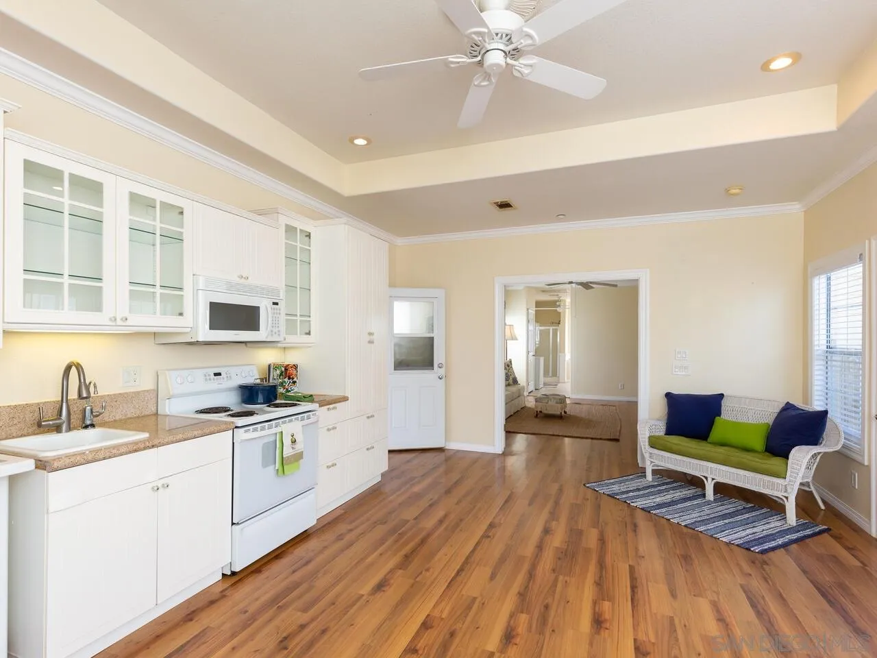 1732 Tavern Road Alpine, CA 91901 - Photo 18 of 60 a kitchen with a sink and wooden floor