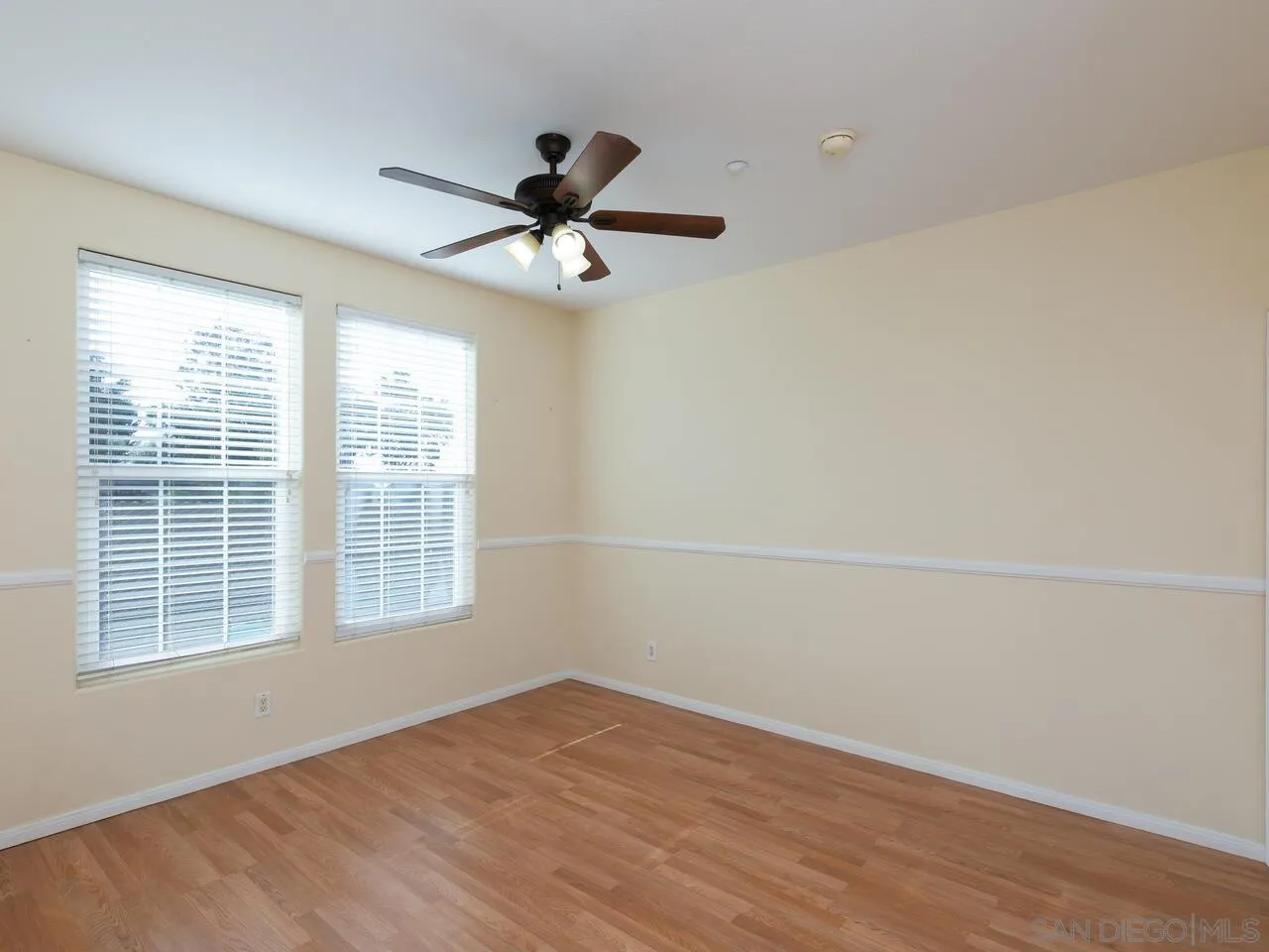 1732 Tavern Road Alpine, CA 91901 - Photo 21 of 60 a view of empty room with wooden floor and fan