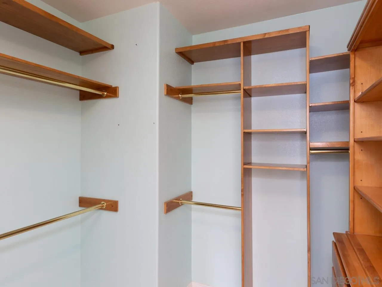 1732 Tavern Road Alpine, CA 91901 - Photo 25 of 60 a view of walk in closet with empty racks
