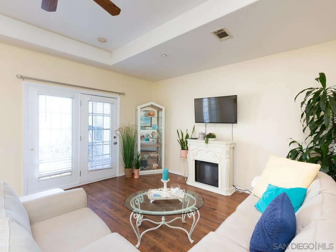 1732 Tavern Road Alpine, CA 91901 - Photo 30 of 60 a living room with furniture a fireplace and a flat screen tv