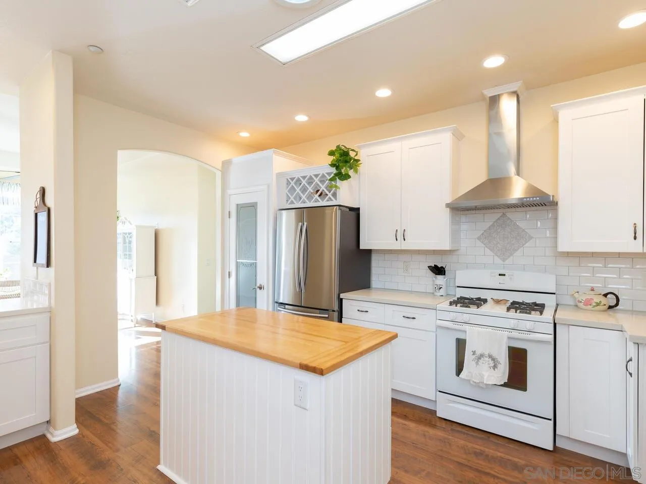 1732 Tavern Road Alpine, CA 91901 - Photo 36 of 60 a kitchen with stainless steel appliances granite countertop a sink a stove a refrigerator and a stove