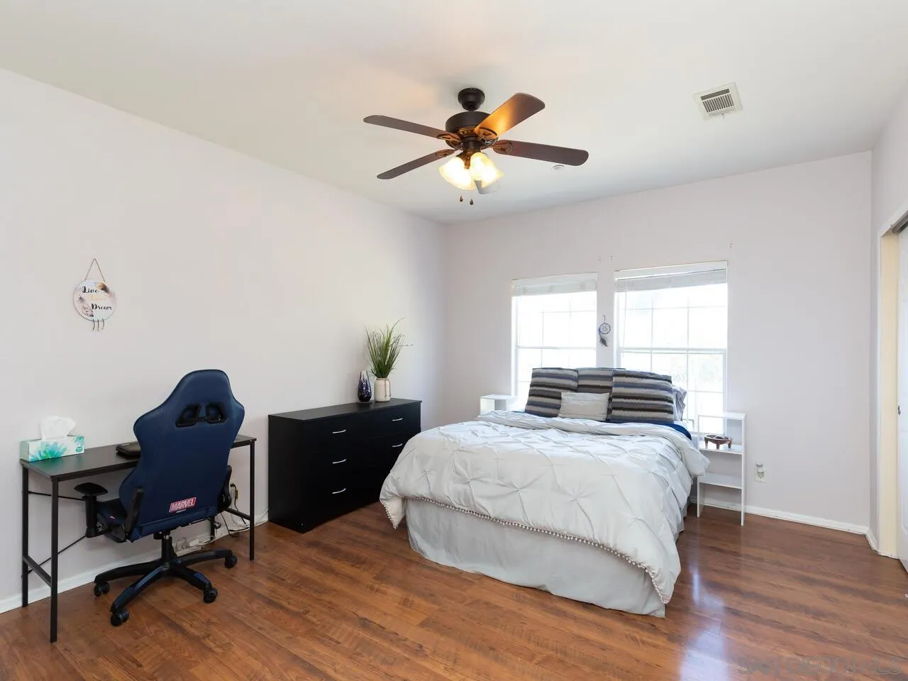 1732 Tavern Road Alpine, CA 91901 - Photo 39 of 60 a bedroom with a bed and a desk