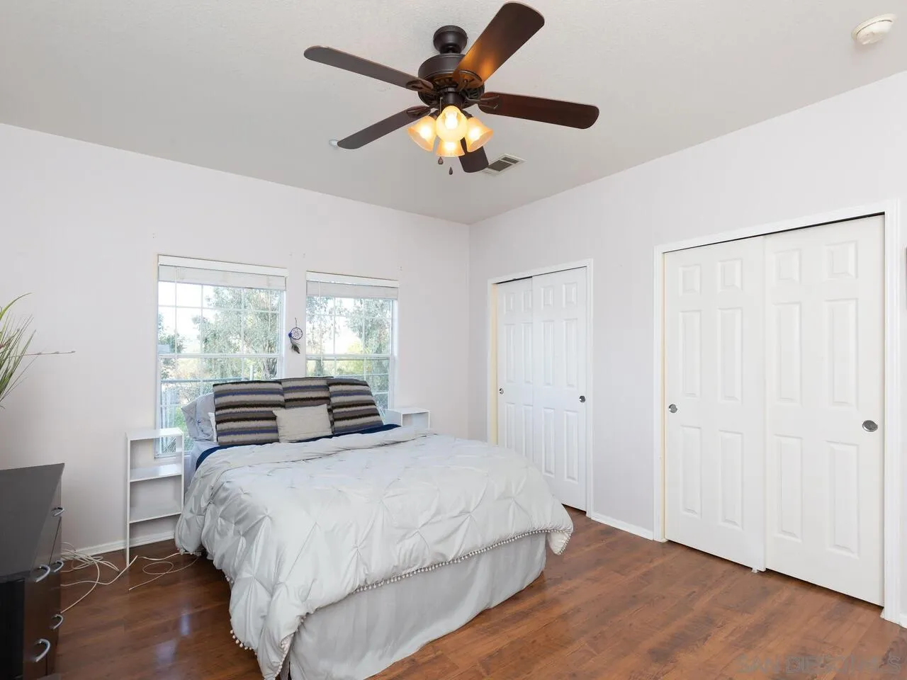 1732 Tavern Road Alpine, CA 91901 - Photo 40 of 60 a bedroom with a large bed and a window