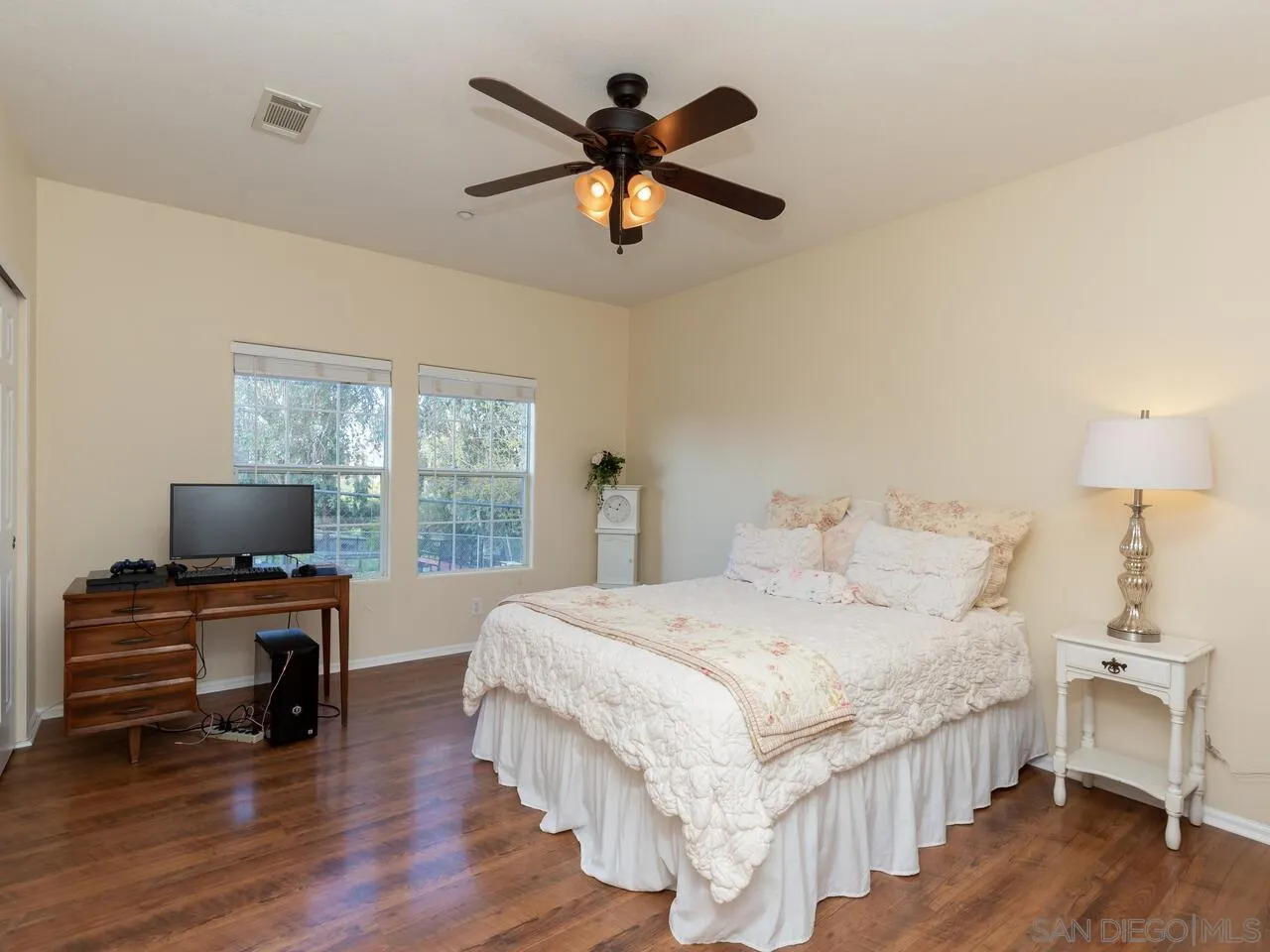 1732 Tavern Road Alpine, CA 91901 - Photo 41 of 60 a bedroom with a bed and a flat screen tv