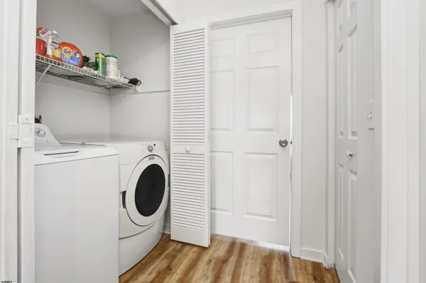 a view of a storage & utility room with washer and dryer