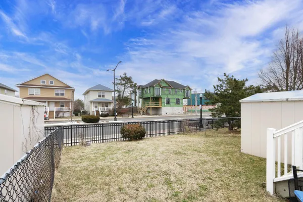 a view of house with outdoor seating space