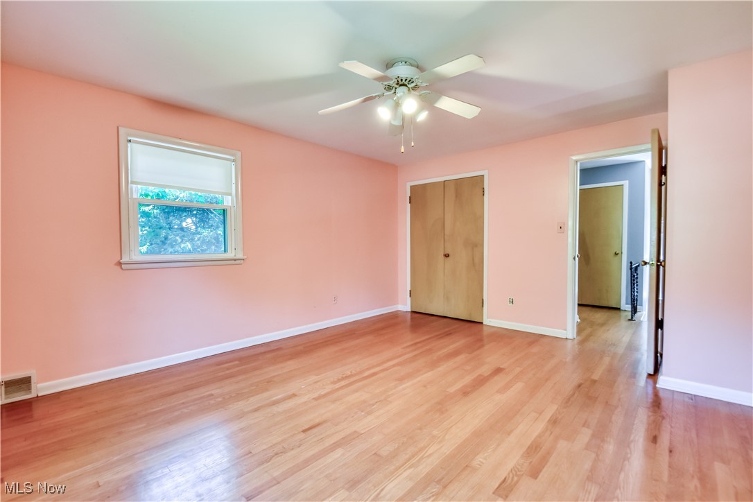 2607 Ashurst Road University Heights, OH 44118 - Photo 29 of 39 Unfurnished bedroom featuring light wood finished floors and a ceiling fan