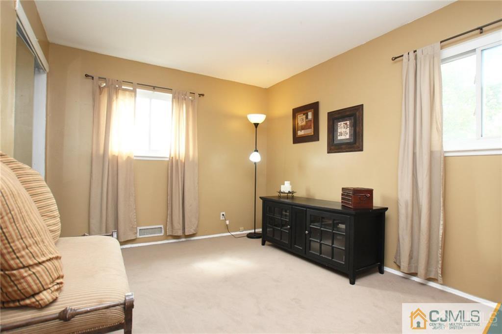 28 Appleman Road Somerset, NJ 08873 - Photo 20 of 25 a spacious bedroom with a bed and a window