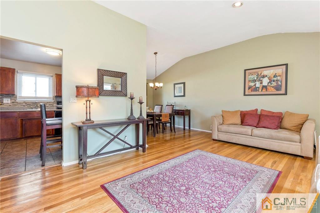 28 Appleman Road Somerset, NJ 08873 - Photo 10 of 25 a living room with furniture and wooden floor