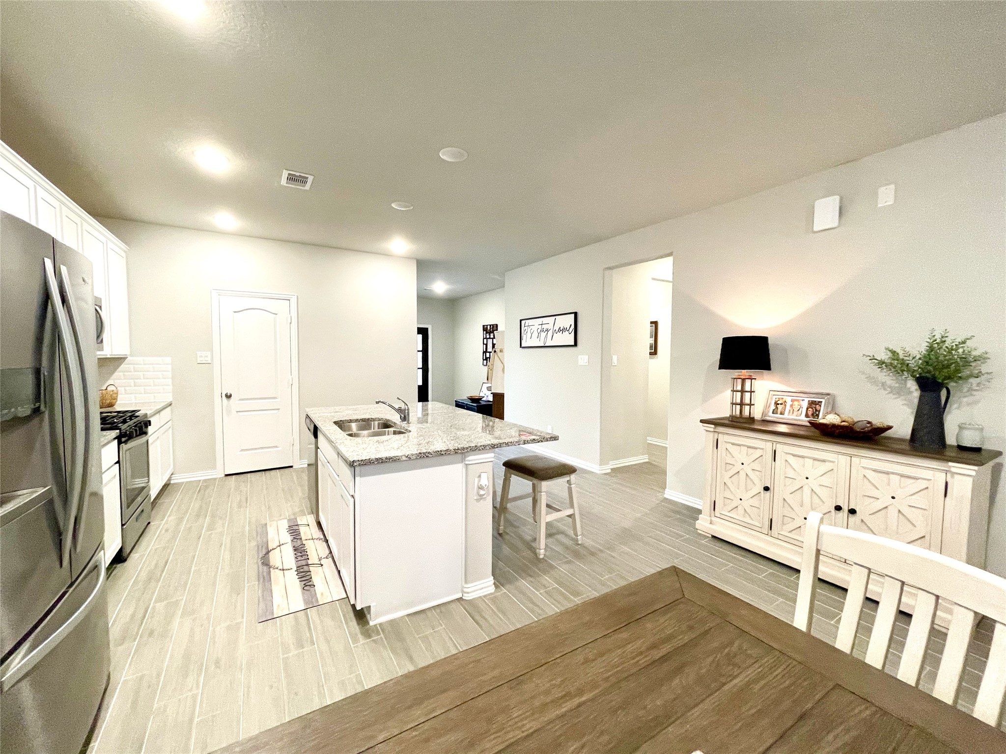 8319 Divot Trace Fulshear, TX 77441 - Photo 14 of 37 Kitchen area and fridge included