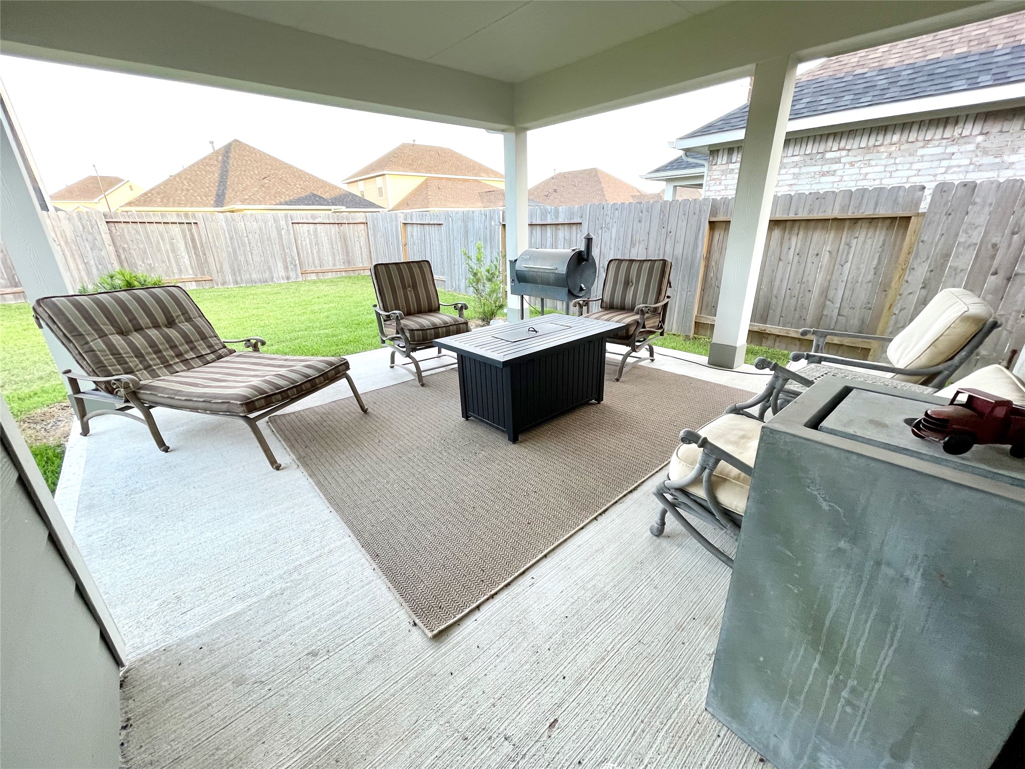 8319 Divot Trace Fulshear, TX 77441 - Photo 32 of 37 Extended covered patio with gas conection