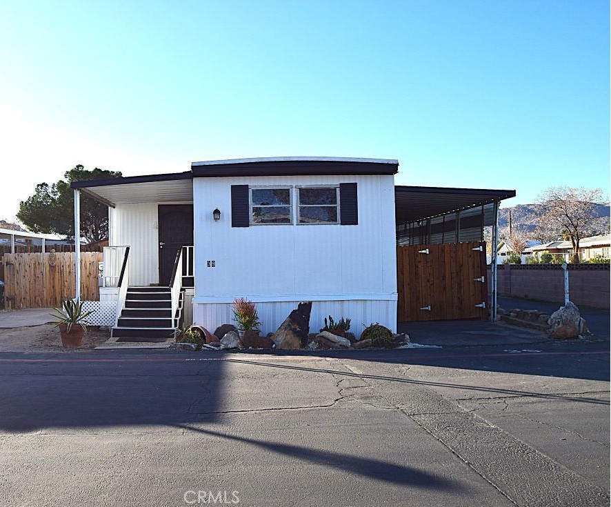 a view of a house with street