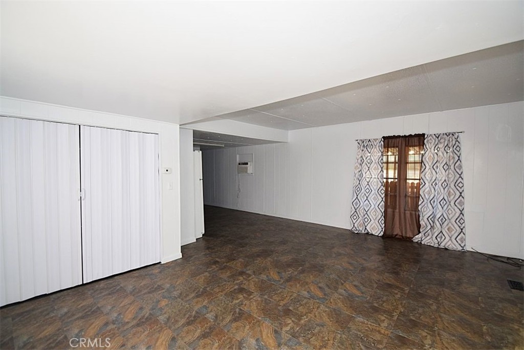 6426 Valley View Street, Unit 39 Joshua Tree, CA 92252 - Photo 4 of 11 an empty room with windows