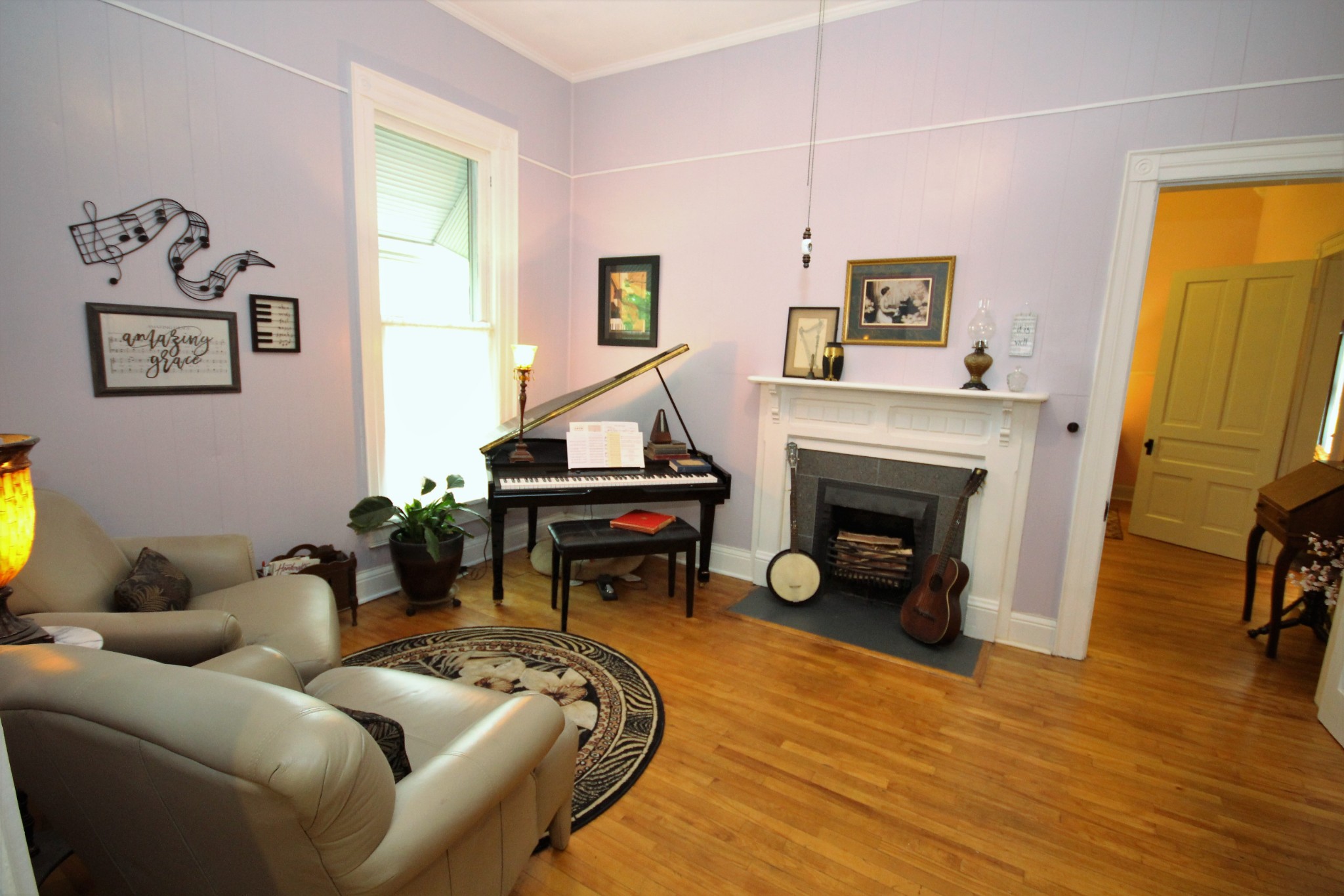 312 North Main Street Springfield, TN 37172 - Photo 19 of 47 a living room with furniture and a fireplace