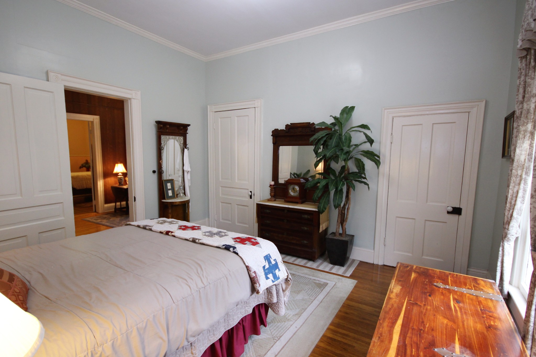 312 North Main Street Springfield, TN 37172 - Photo 27 of 47 a bedroom with a bed and a potted plant