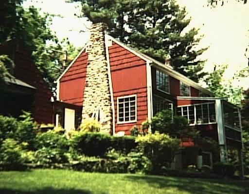 172 Range Road Wilton, CT 06897 - Photo 1 of 1 a house view with a garden space