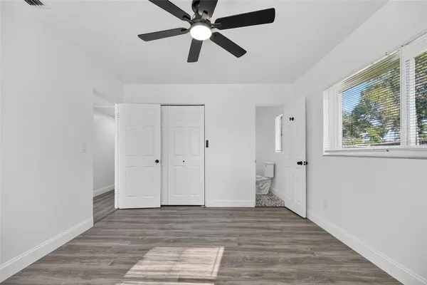 an aerial view of residential houses with outdoor space and swimming pool