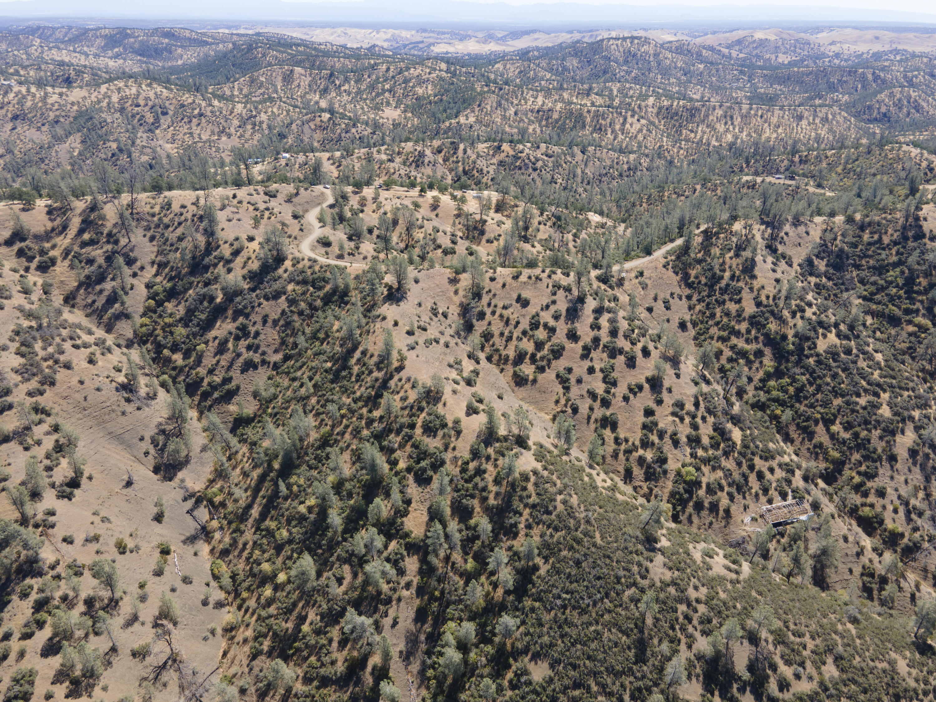 4100 Yolla Bolly Road Igo, CA 96047 - Photo 13 of 24 an aerial view of house with yard and mountain view in back
