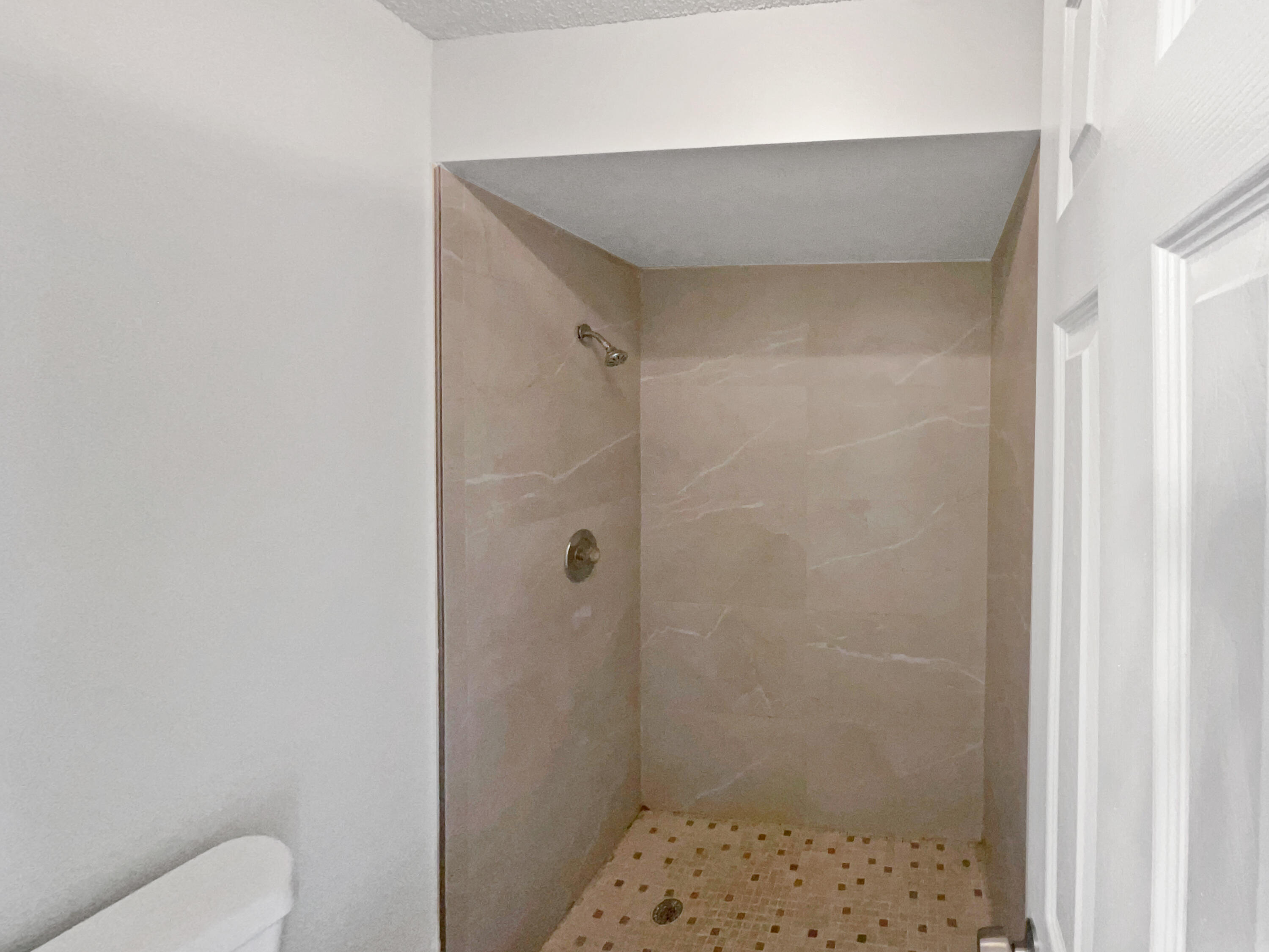4249 Willow Pond Circle West Palm Beach, FL 33417 - Photo 22 of 30 a bathroom with a shower