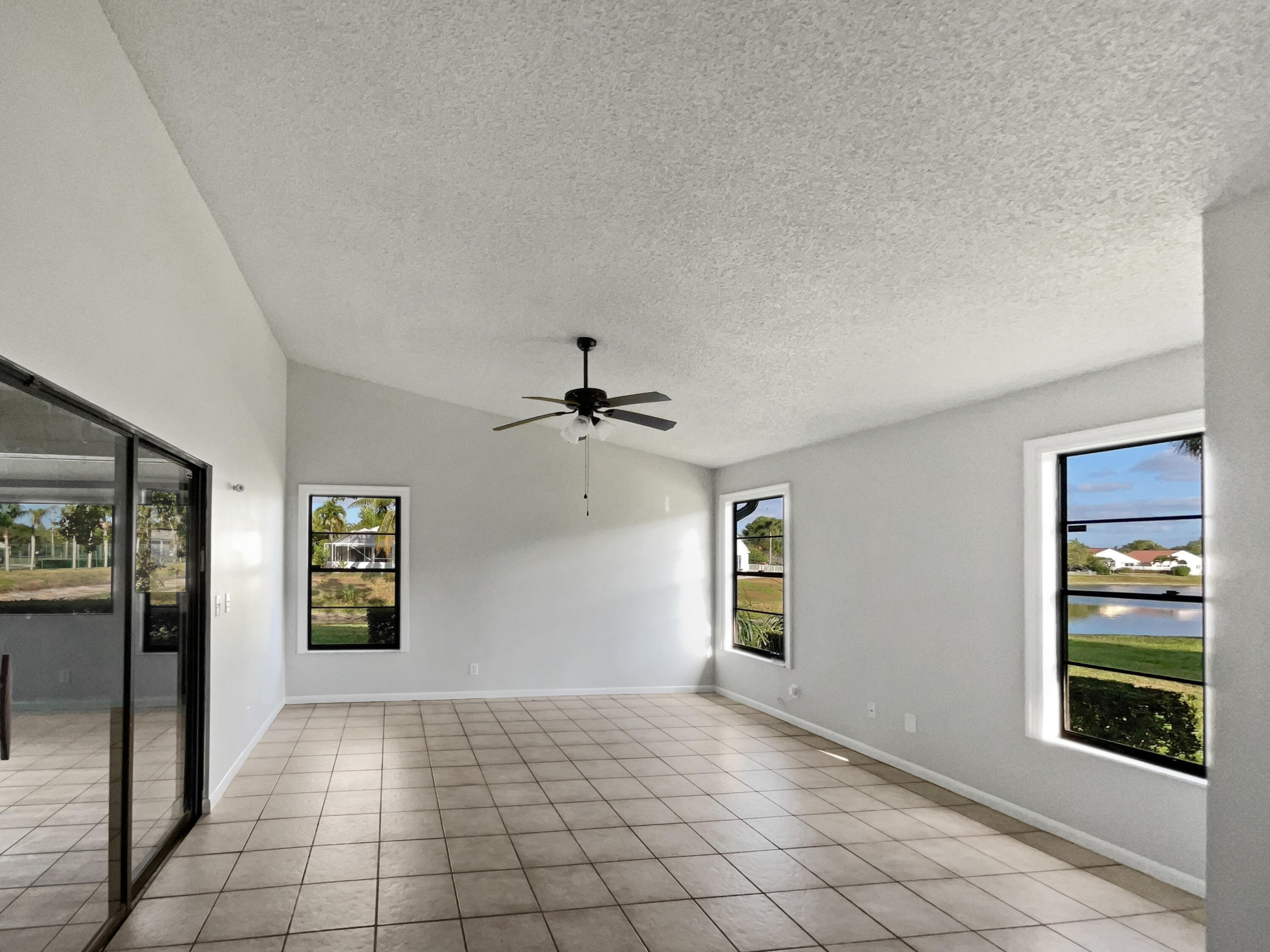 4249 Willow Pond Circle West Palm Beach, FL 33417 - Photo 25 of 30 a view of an empty room and window