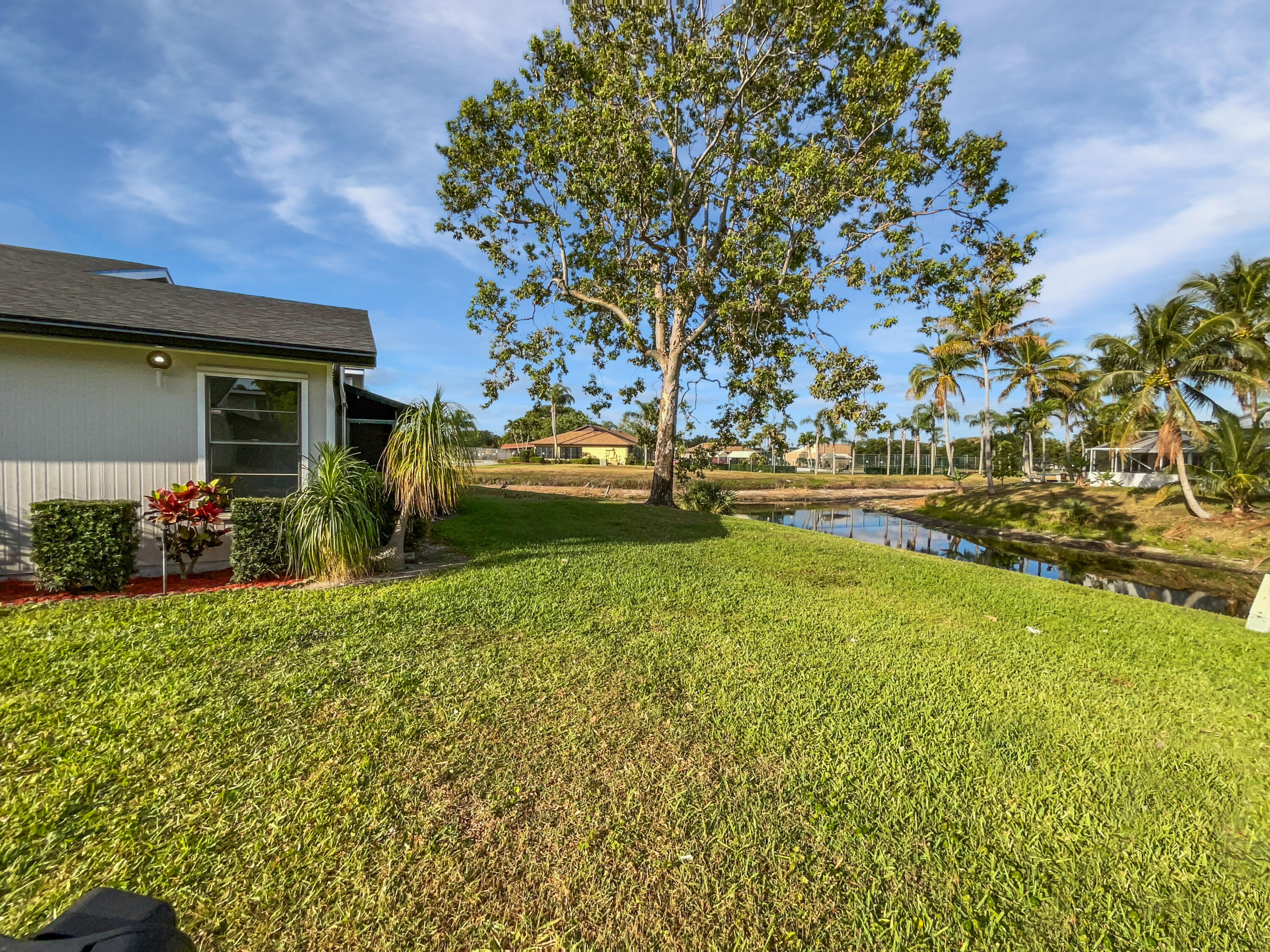 4249 Willow Pond Circle West Palm Beach, FL 33417 - Photo 10 of 30 a view of backyard with outdoor space