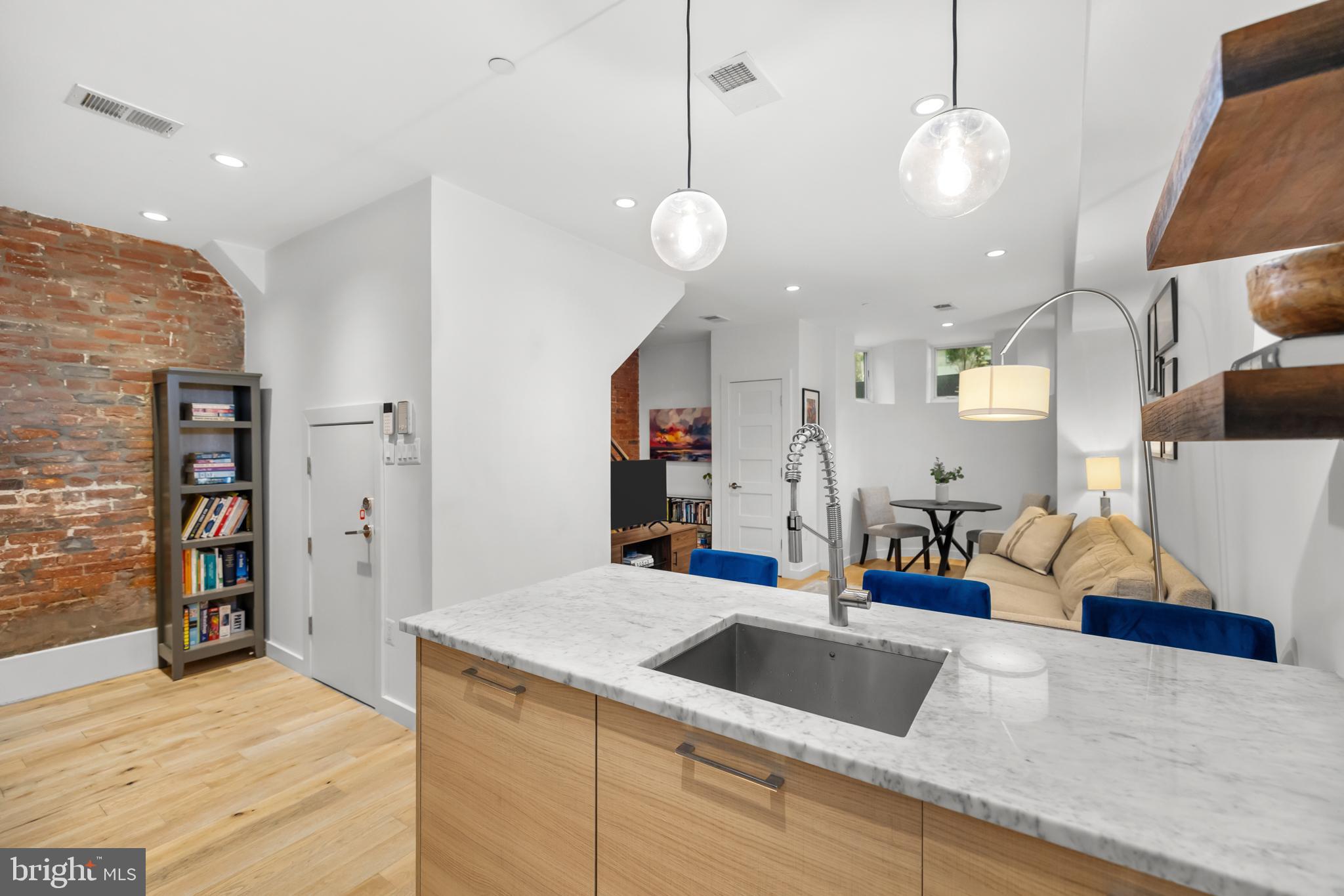 1324 W Street Northwest, Unit 1 Washington, DC 20009 - Photo 13 of 37 a view of a kitchen and living room
