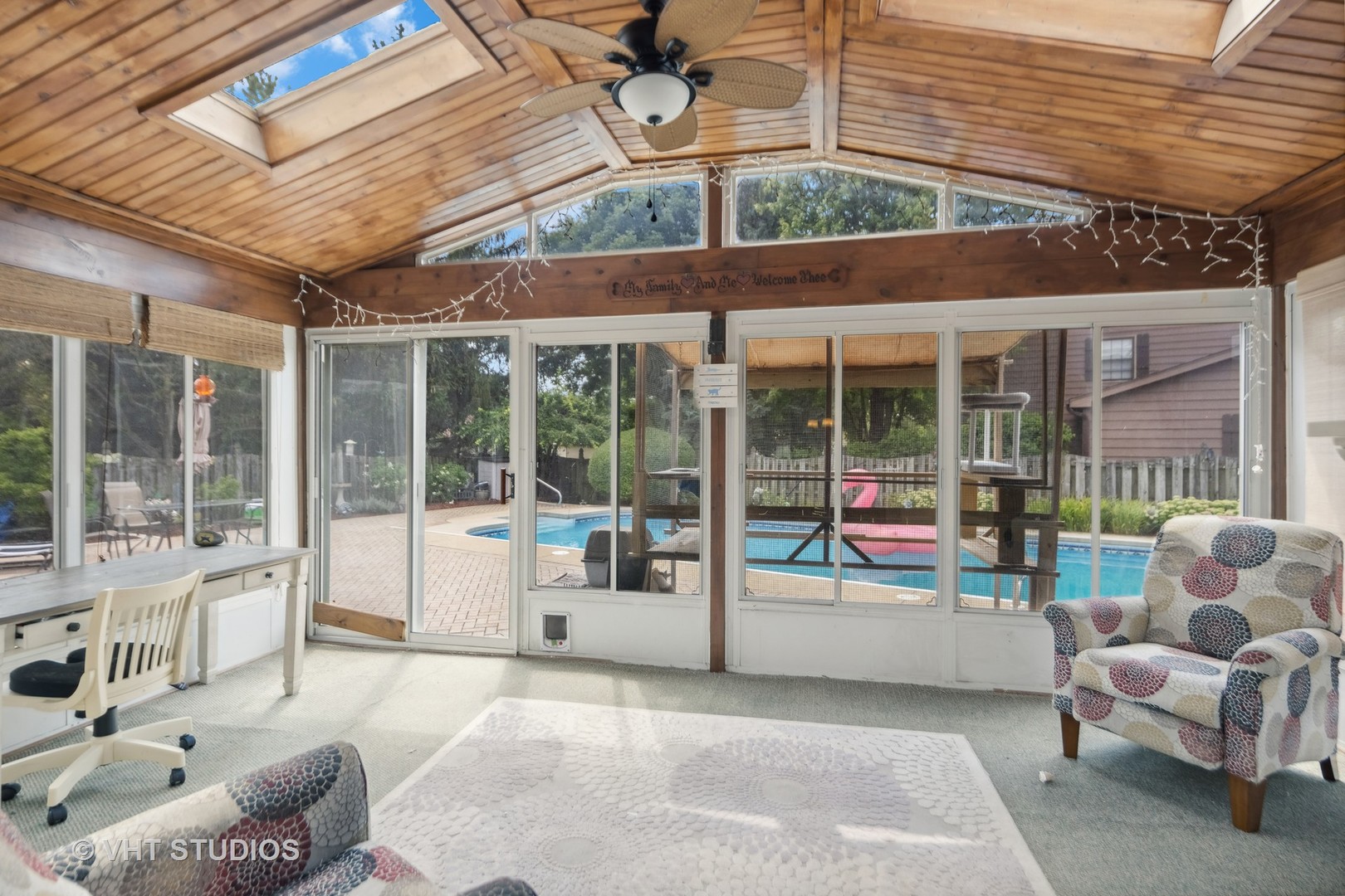718 Raintree Drive Naperville, IL 60540 - Photo 12 of 41 a view of a patio with a table and chairs and potted plants
