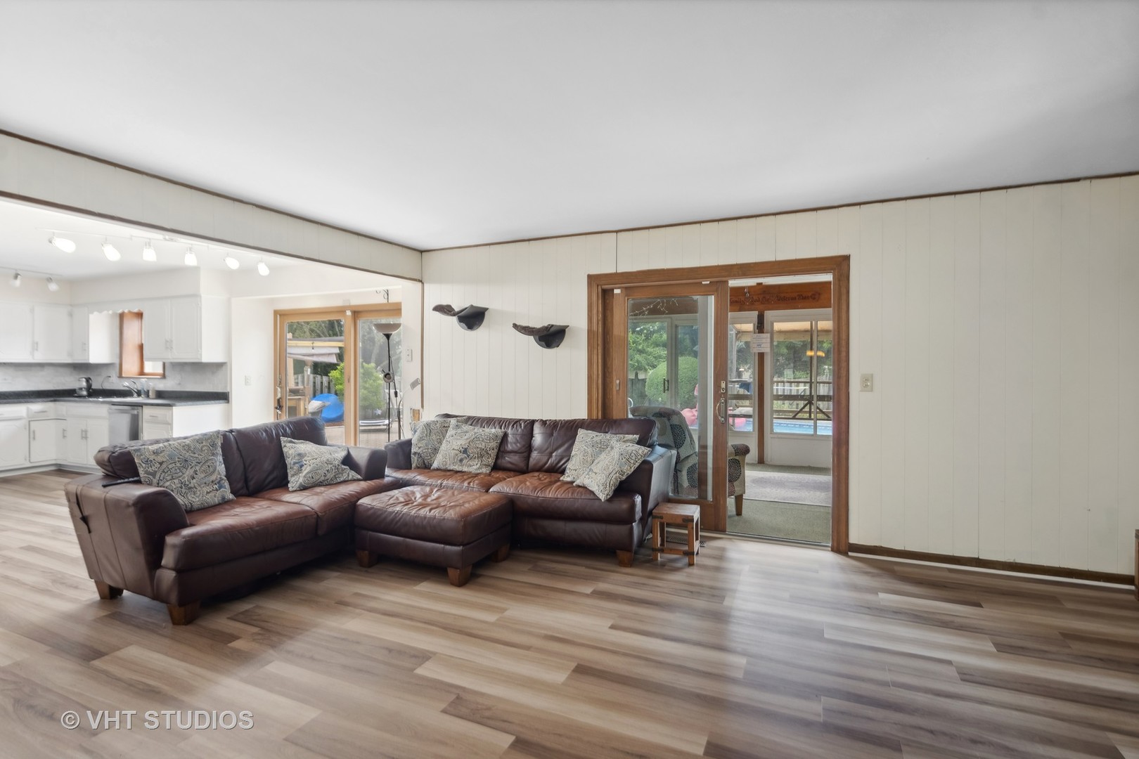 718 Raintree Drive Naperville, IL 60540 - Photo 14 of 41 a living room with furniture and a large window