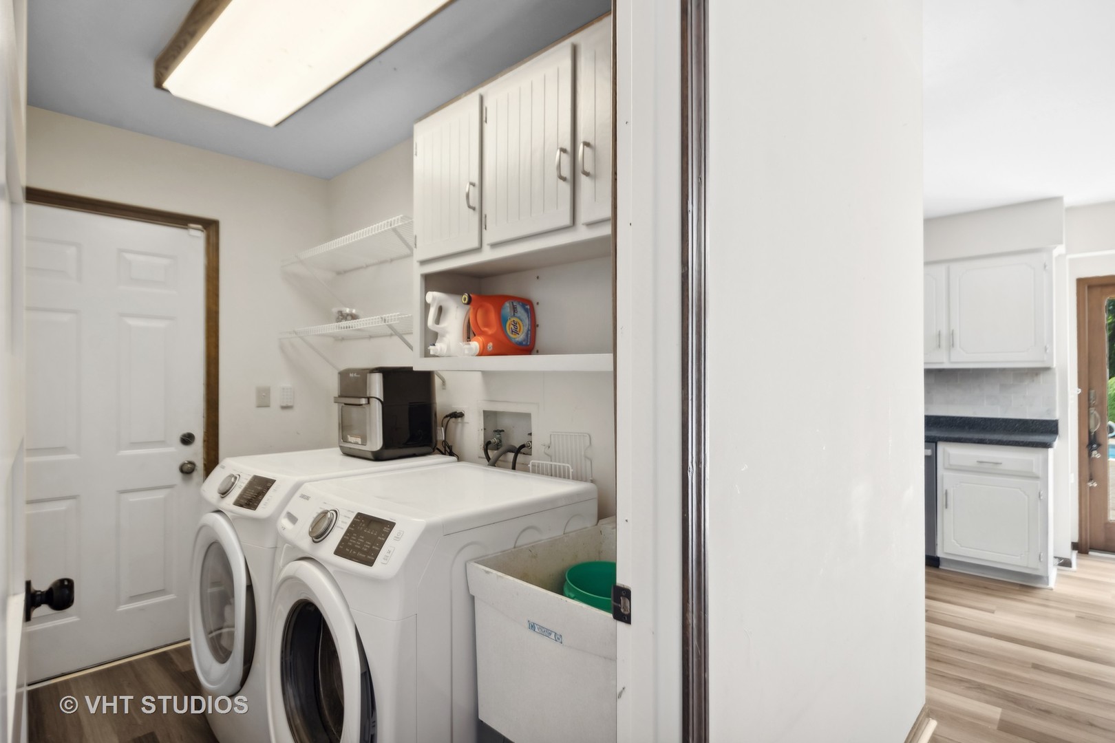718 Raintree Drive Naperville, IL 60540 - Photo 21 of 41 a utility room with dryer and washer
