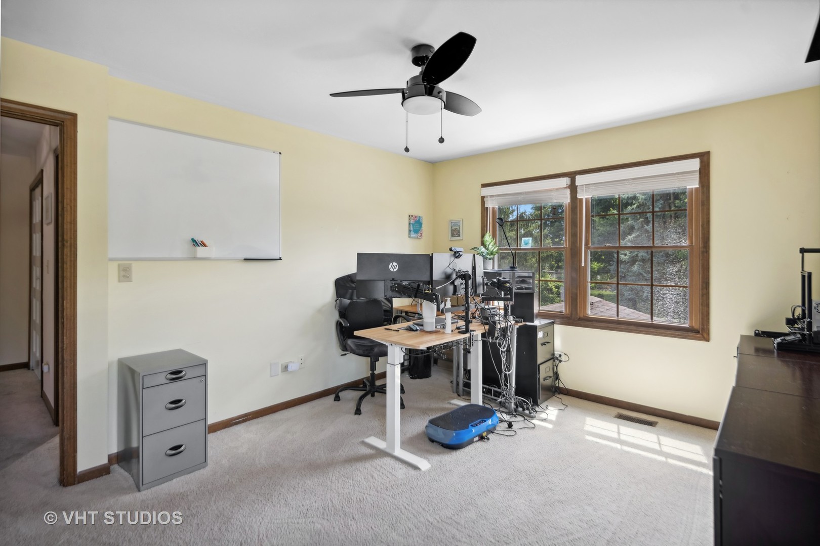 718 Raintree Drive Naperville, IL 60540 - Photo 31 of 41 a view of a workspace with furniture and a window