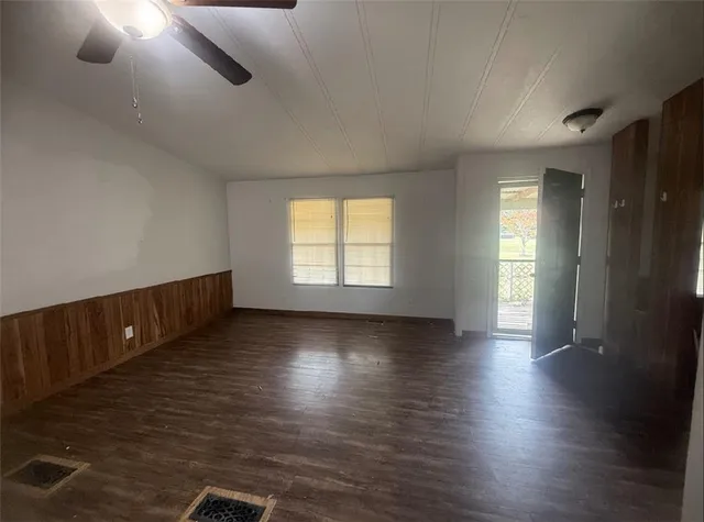 a view of a kitchen from the hallway