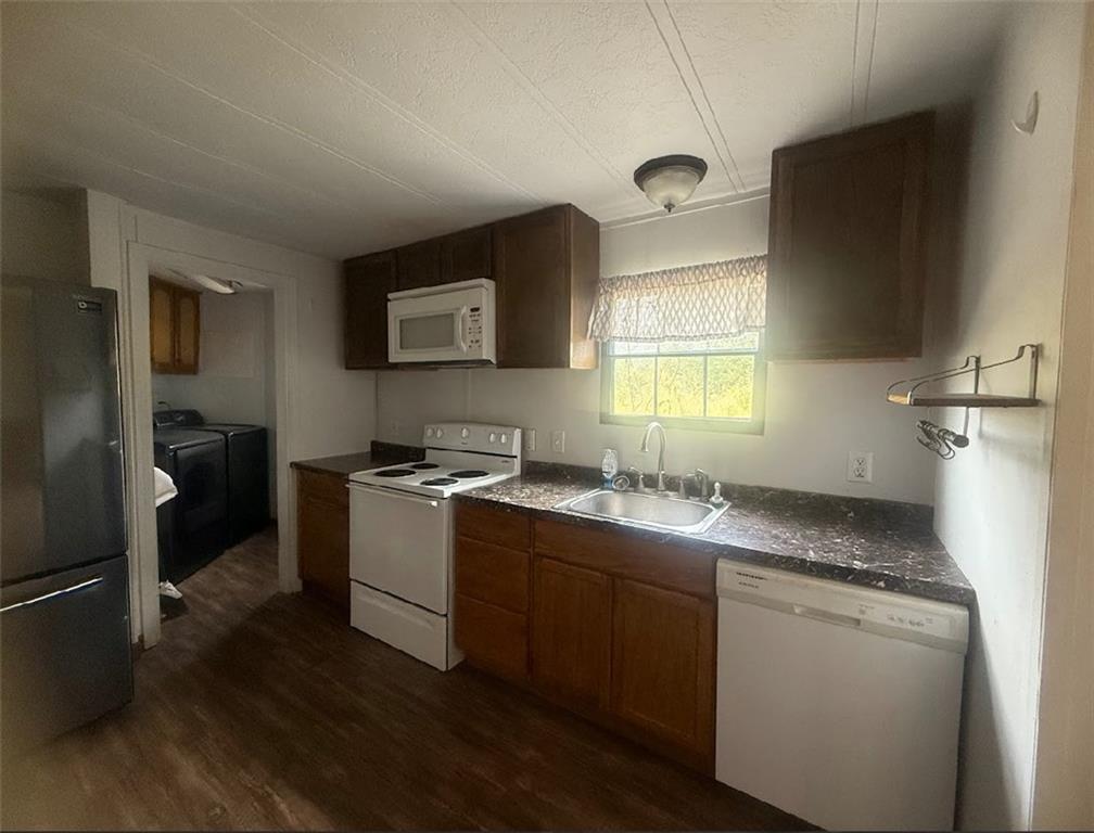 5491 Bold Springs Road Dacula, GA 30019 - Photo 15 of 28 a kitchen with a sink cabinets and window