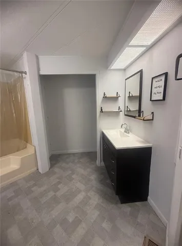 a bathroom with a sink and a toilet