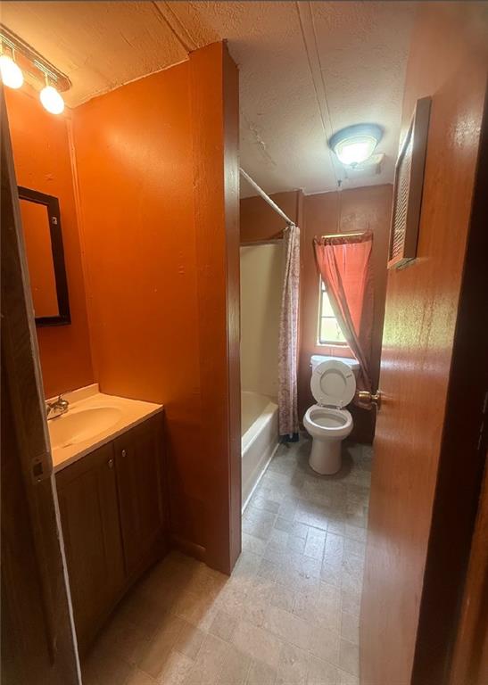 5491 Bold Springs Road Dacula, GA 30019 - Photo 25 of 28 a view of bathroom with a toilet sink and mirror