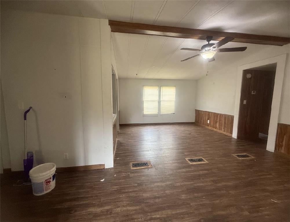 5491 Bold Springs Road Dacula, GA 30019 - Photo 9 of 28 a view of an empty room with wooden floor and a window