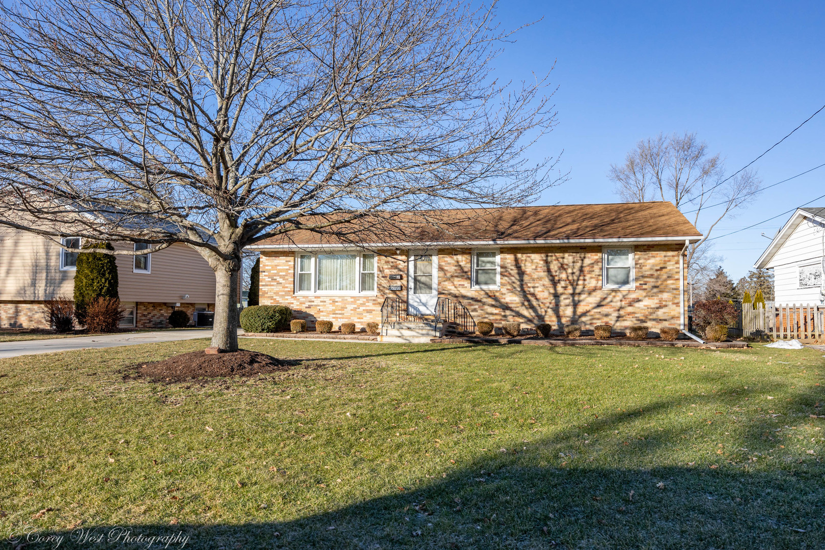 219 Reid Road Genoa, IL 60135 - Photo 1 of 23 a view of a house with backyard and sitting area