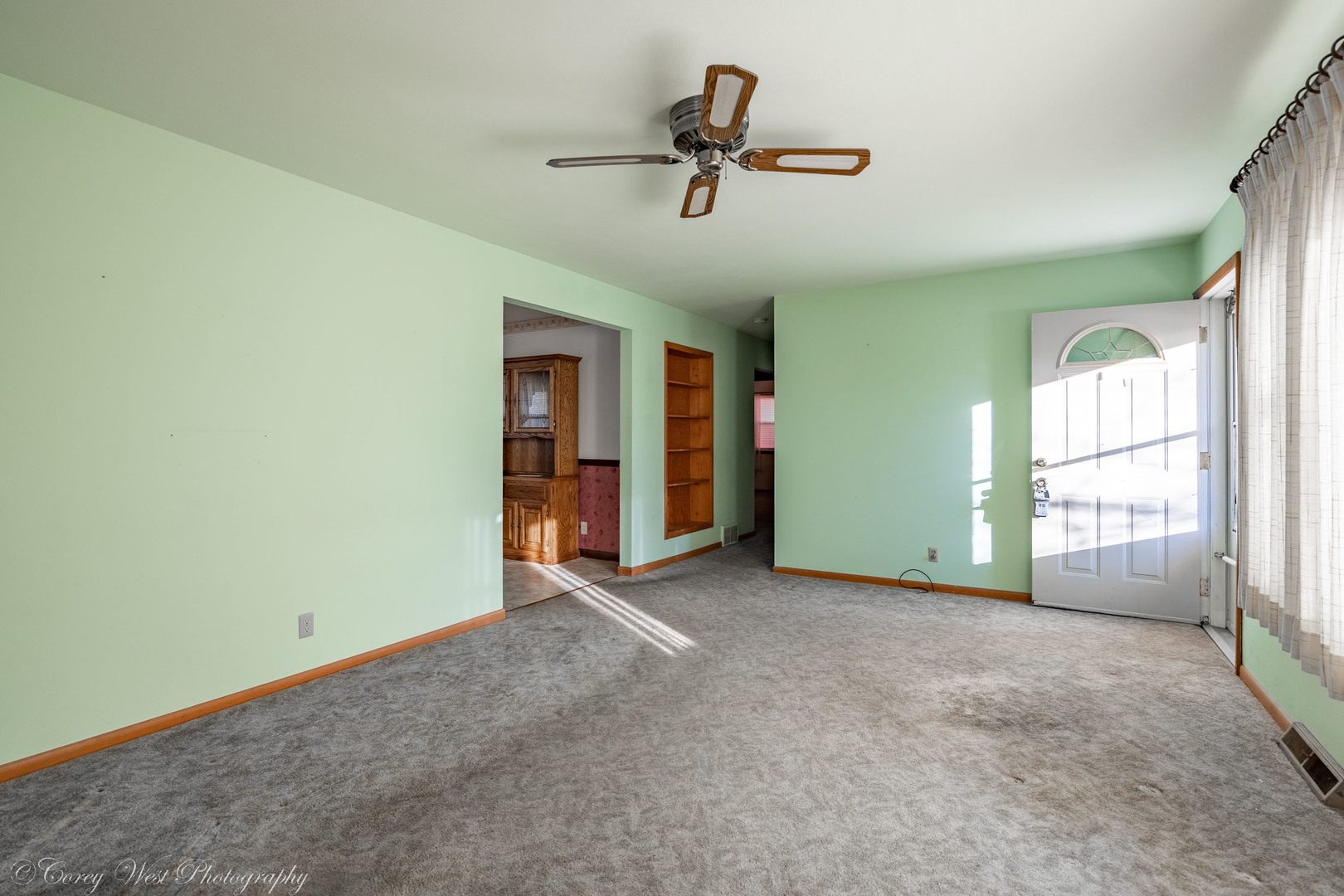 219 Reid Road Genoa, IL 60135 - Photo 5 of 23 a view of an empty room with a window