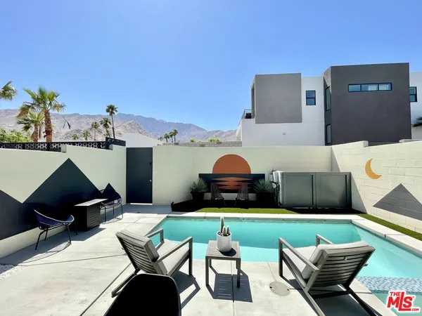 a view of a patio in backyard