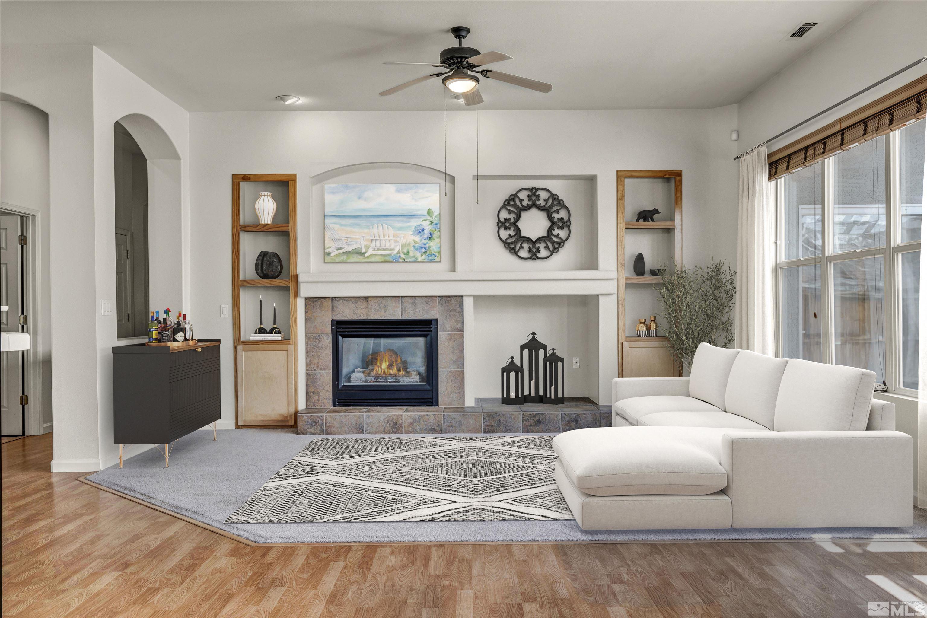 9705 Rolling Rock Court Reno, NV 89521 - Photo 1 of 19 a living room with furniture and a fireplace