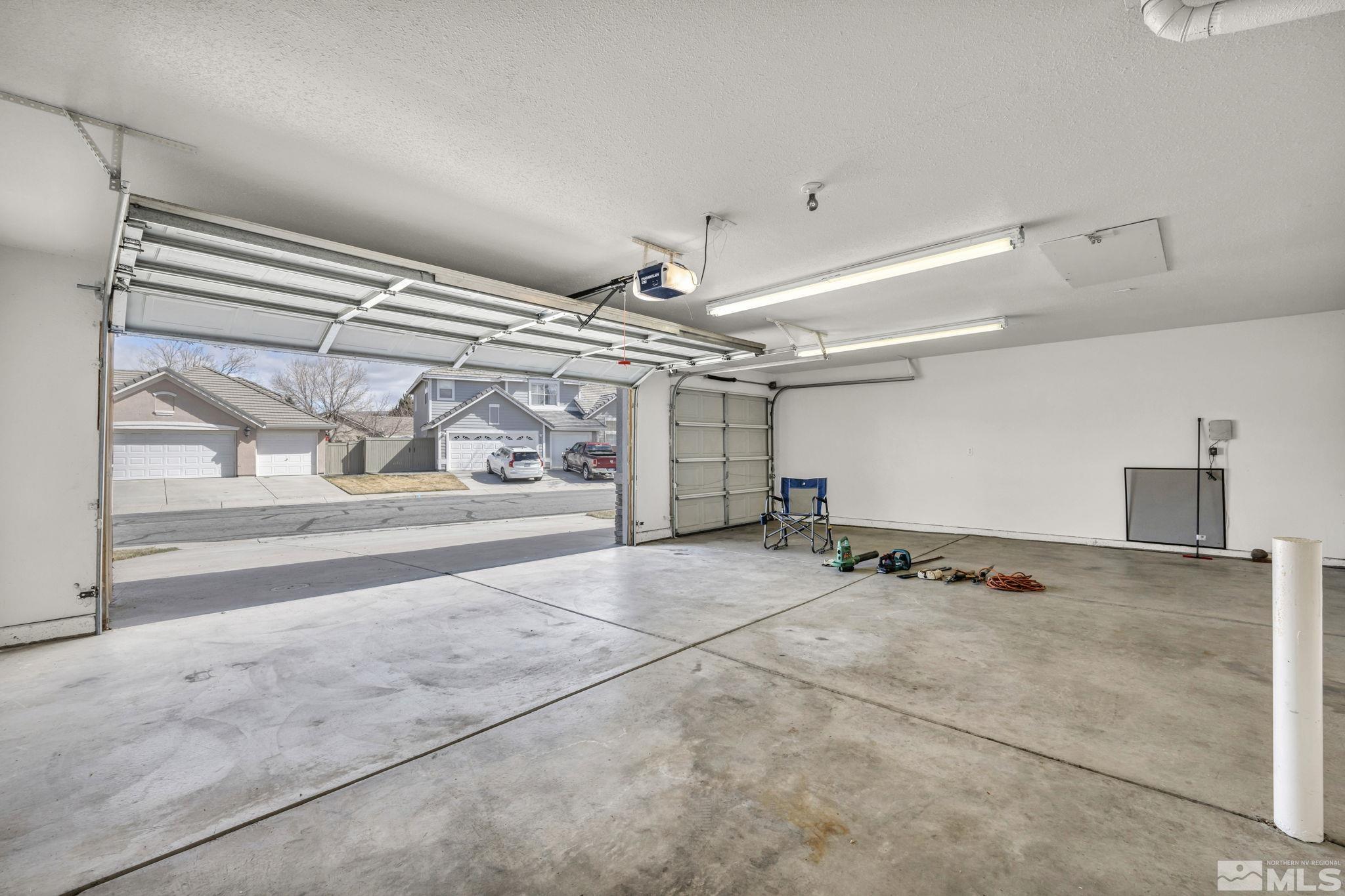 9705 Rolling Rock Court Reno, NV 89521 - Photo 11 of 19 a view of a garage with storage