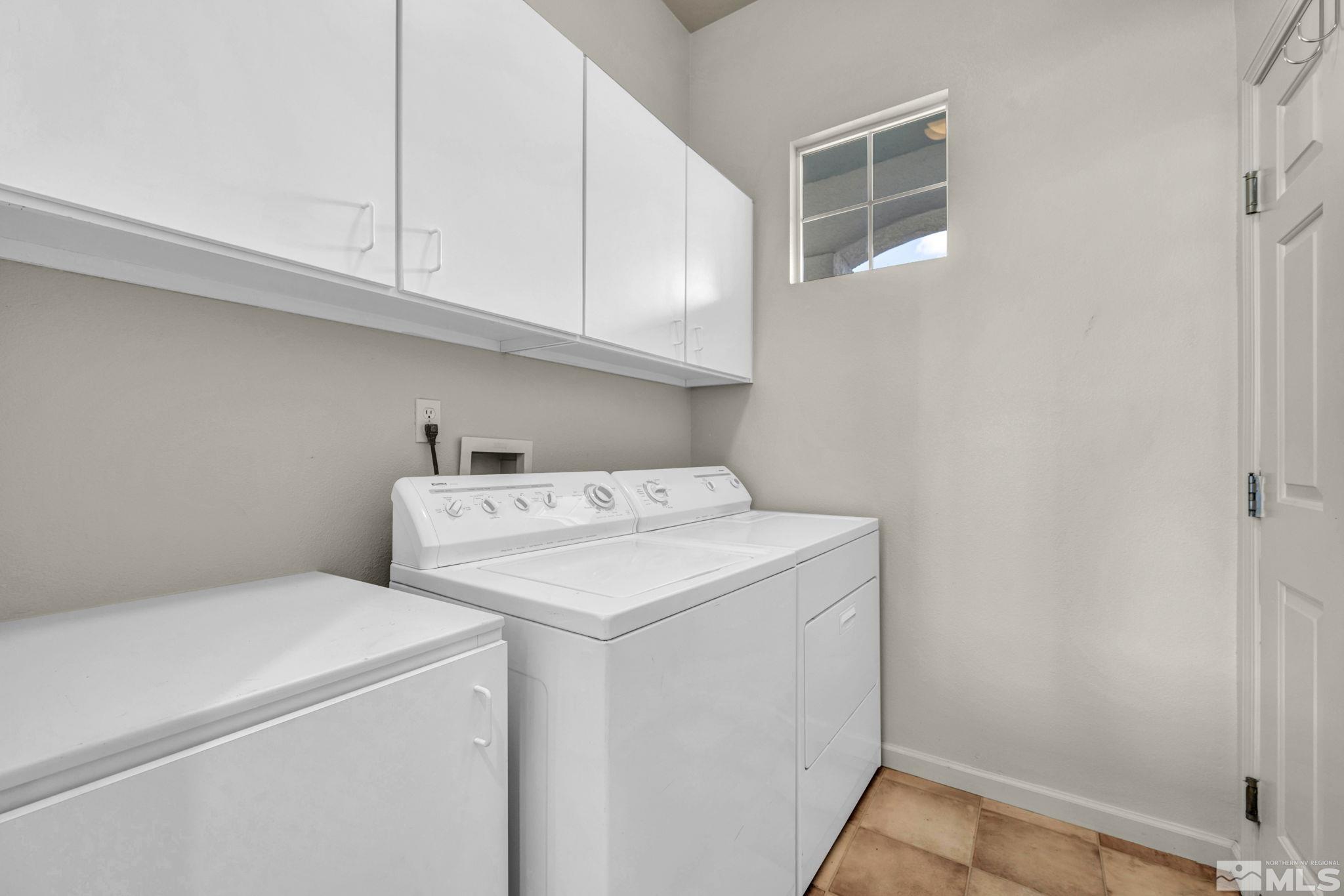 9705 Rolling Rock Court Reno, NV 89521 - Photo 14 of 19 a utility room with dryer and washer