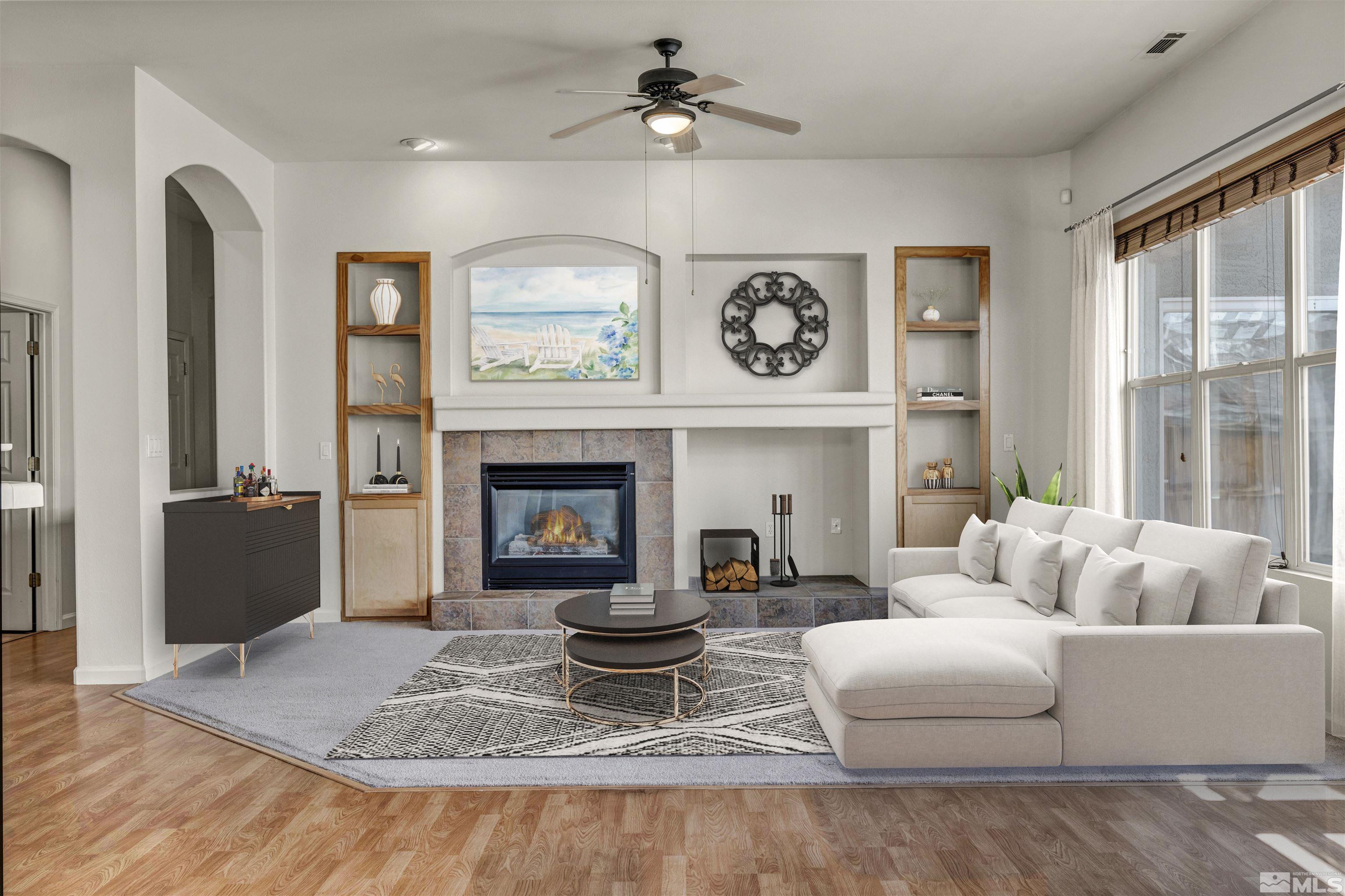 9705 Rolling Rock Court Reno, NV 89521 - Photo 19 of 19 a living room with furniture and a fireplace
