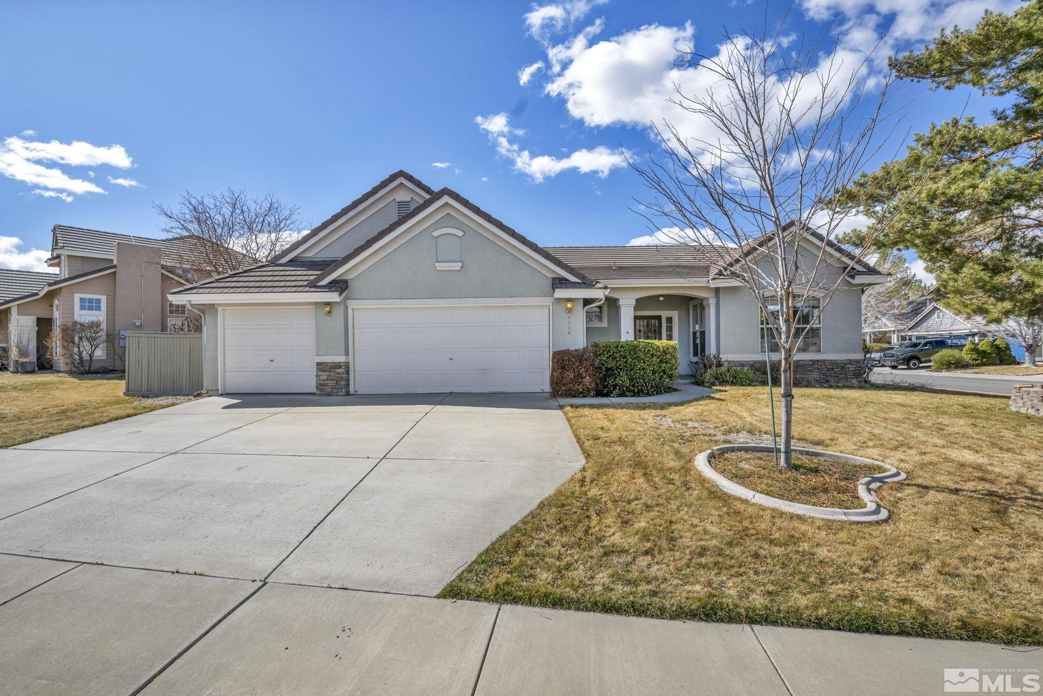 9705 Rolling Rock Court Reno, NV 89521 - Photo 3 of 19 a house view with a garden space