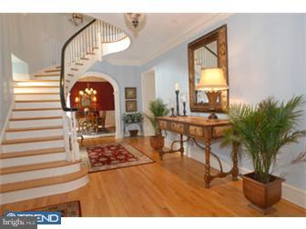 401 Huston Road Radnor, PA 19087 - Photo 3 of 12 a living room with furniture and a potted plant
