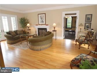 401 Huston Road Radnor, PA 19087 - Photo 5 of 12 a living room with furniture and a fireplace