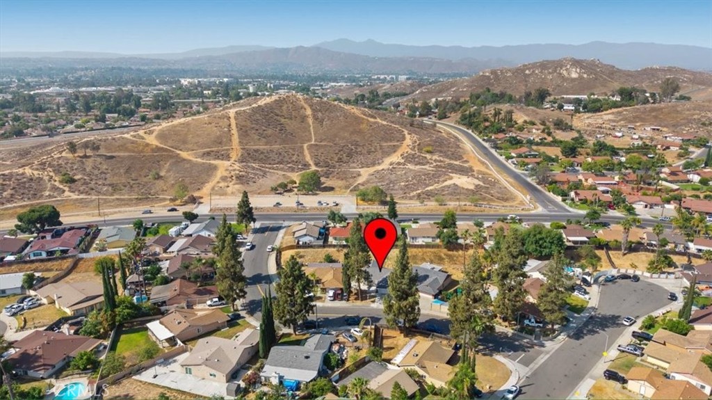 4440 Daniel Drive Riverside, CA 92503 - Photo 20 of 20 an aerial view of residential houses with outdoor space and trees