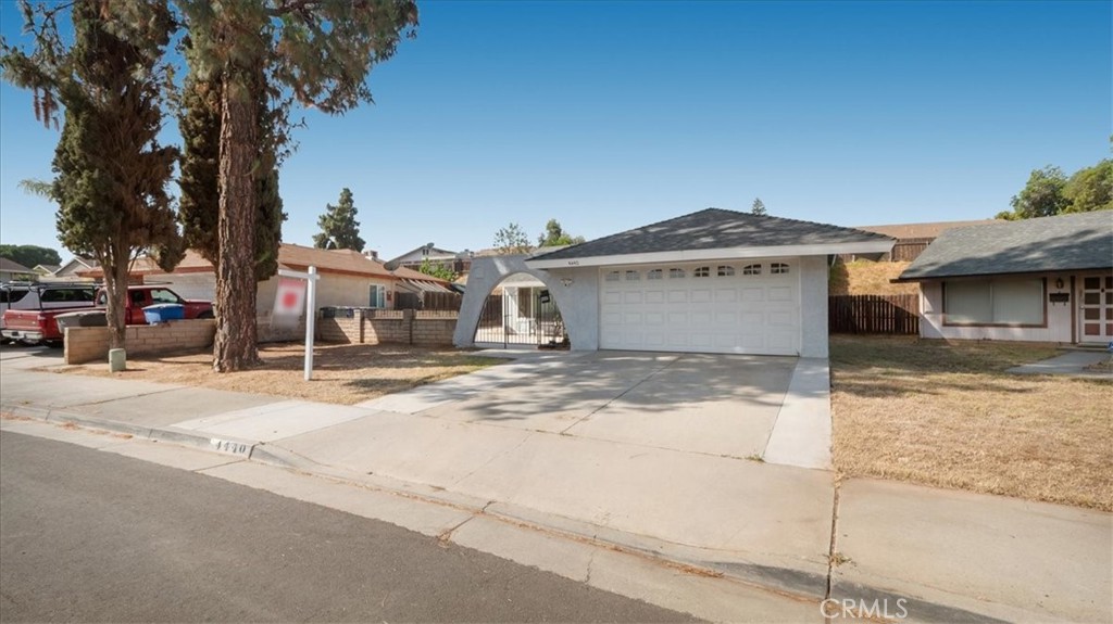4440 Daniel Drive Riverside, CA 92503 - Photo 3 of 20 a front view of a house with a yard