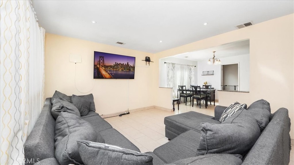 4440 Daniel Drive Riverside, CA 92503 - Photo 7 of 20 a living room with furniture and a large window