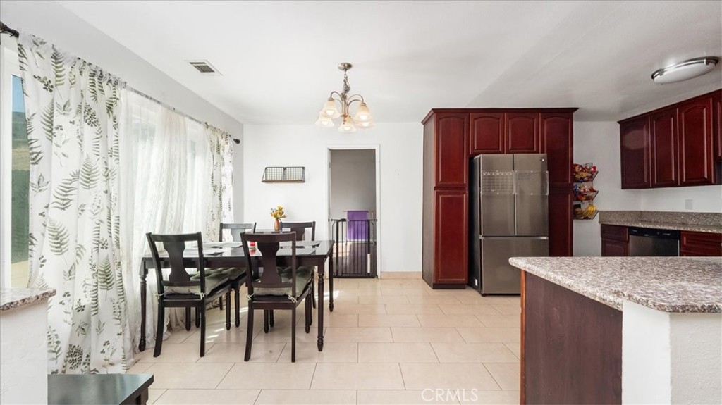 4440 Daniel Drive Riverside, CA 92503 - Photo 9 of 20 a view of a dining room with furniture